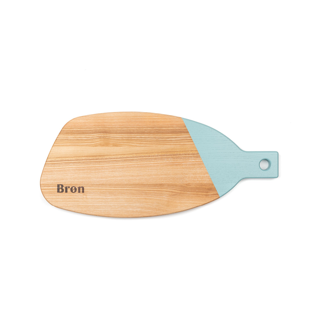 Cutting board in paddle shape