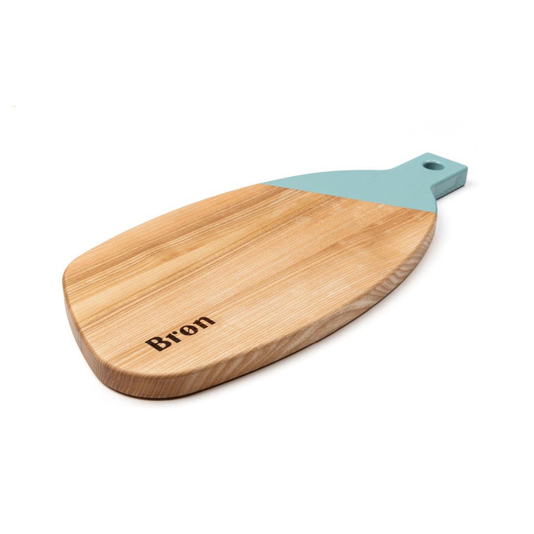 Cutting board in paddle shape
