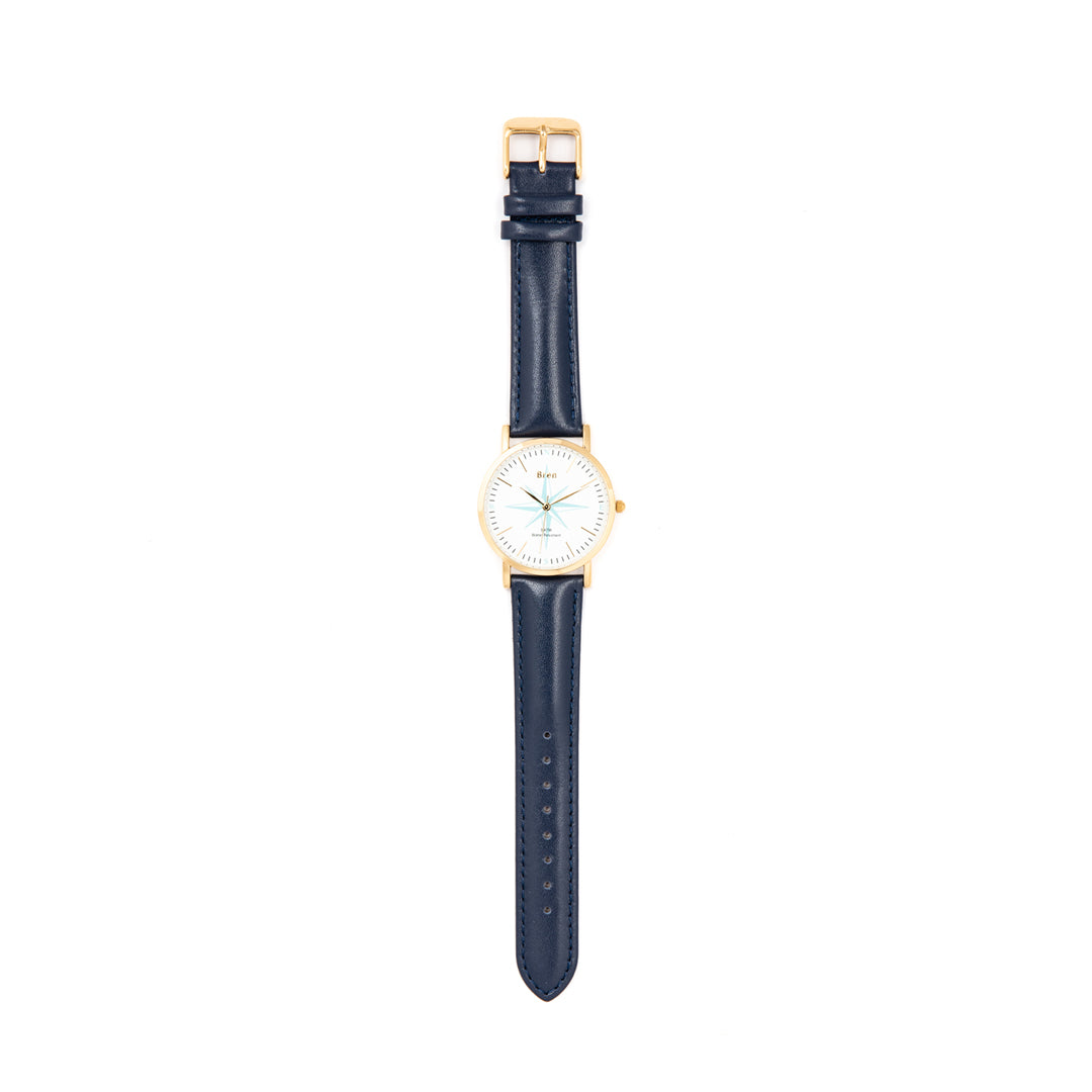 Maritiem gouden horloge met windroos