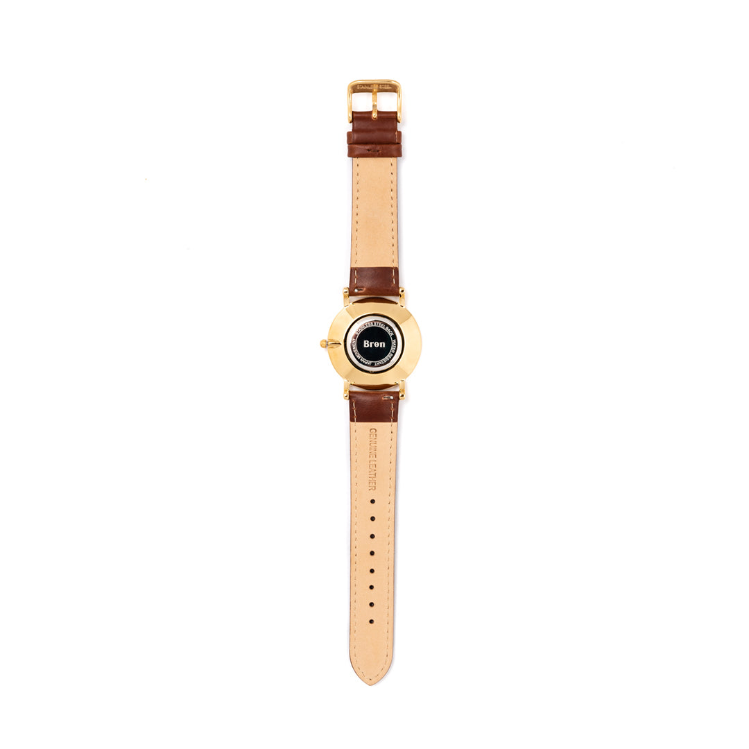 Maritiem gouden horloge met windroos